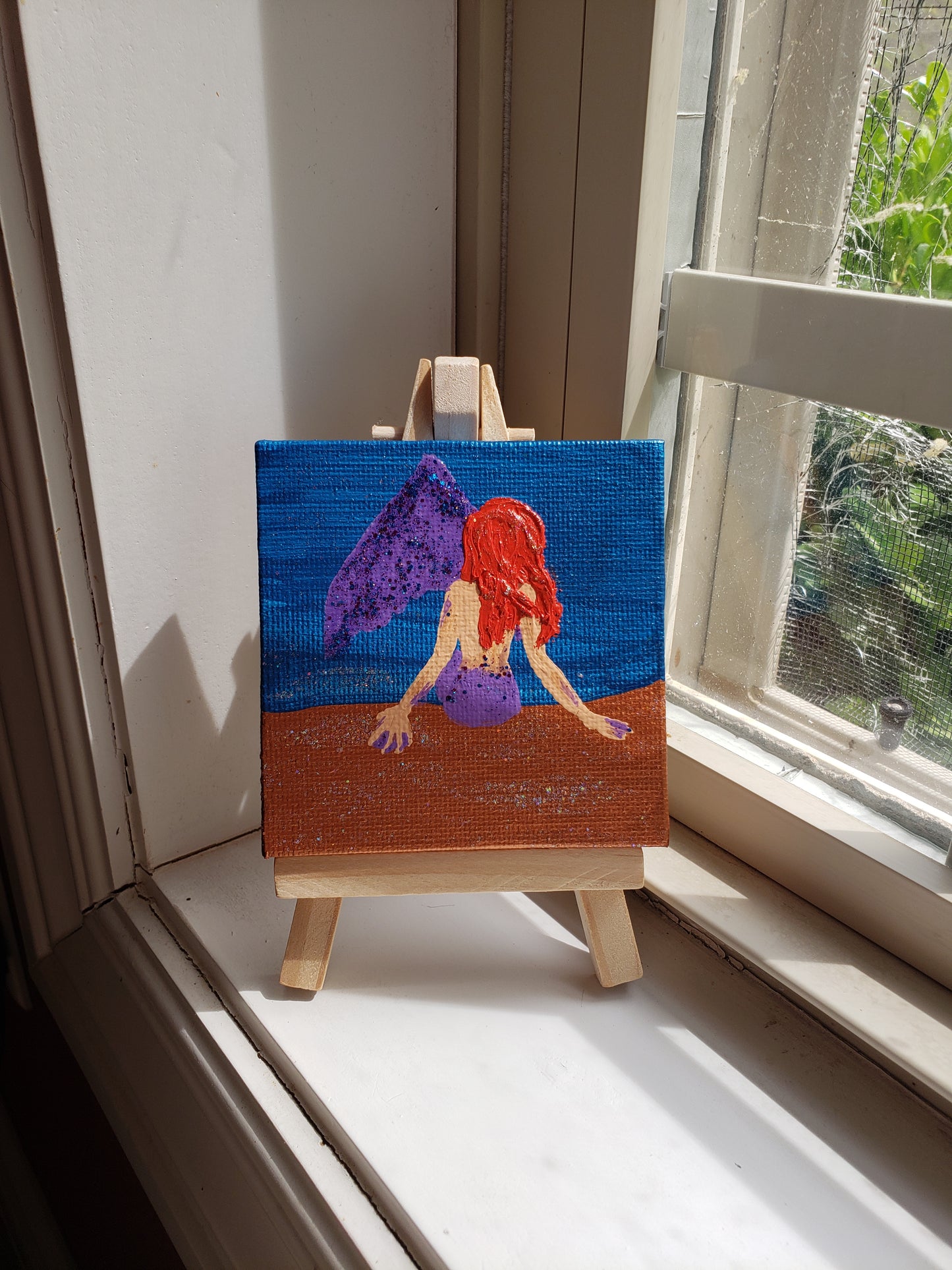 Glittery Mermaid Painting with Easel Red Hair Purple Tail on Sand